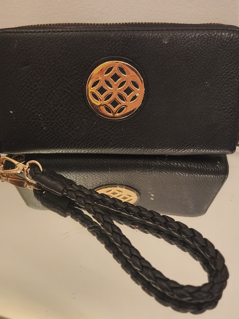 Black Wristlet Clutch with Gold Medallion Accent